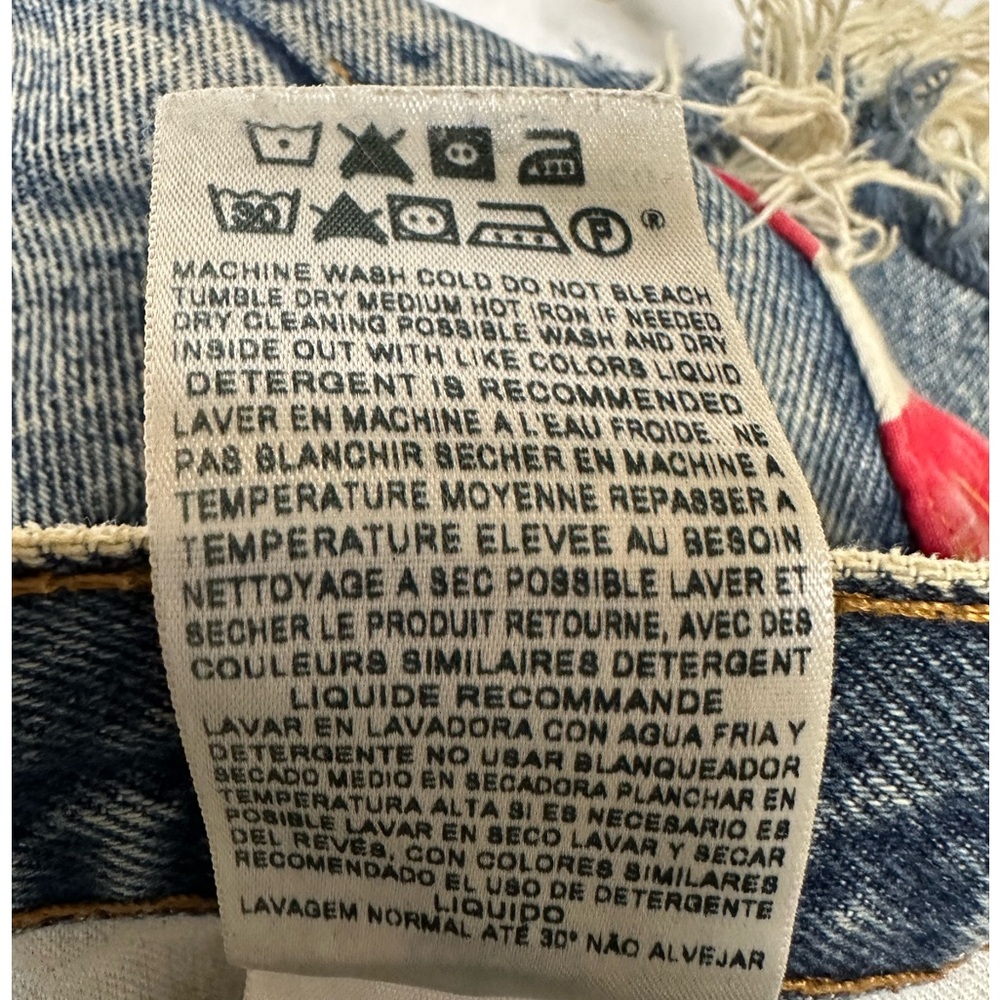 Levi's Distressed Denim Cutoff Shorts with American Flag Pocket - Picture 5 of 7